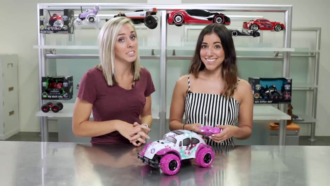 thumbnail video image 2 of Sharper Image® Pixie Cruiser Pink and Purple RC Remote Control Car Toy for Girls with Off-Road Grip Tires Princess Style Big Buggy Crawler, 2 of 13