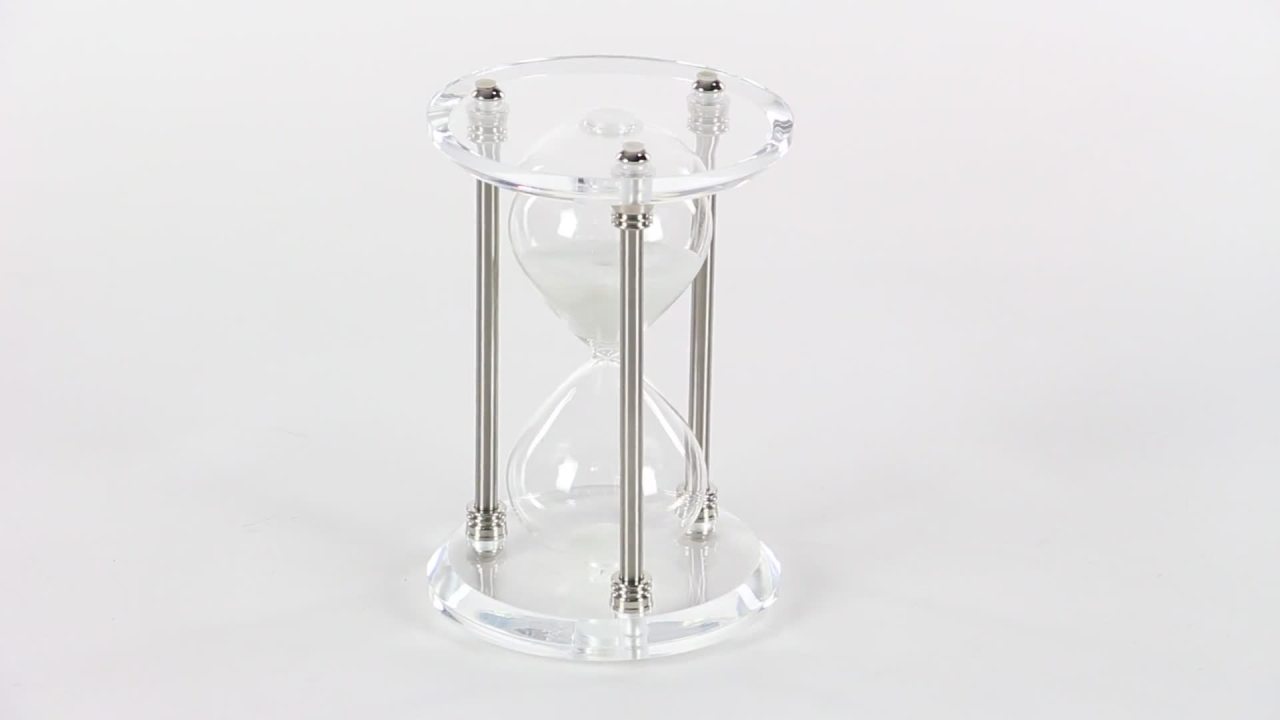 thumbnail video image 2 of DecMode 6" x 9" Silver Metal Hourglass Sand Timer with Acrylic Base, 1-Piece, 2 of 8