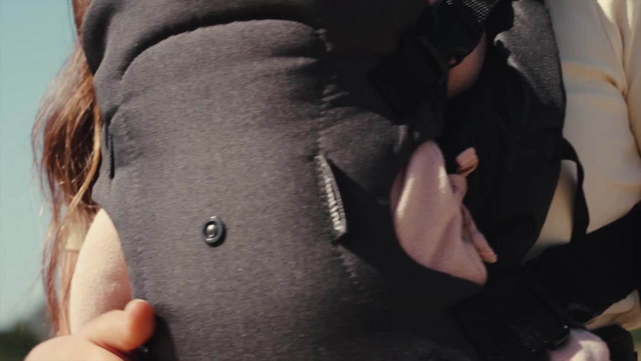 thumbnail video image 2 of Infantino Flip 4-in-1 Convertible Baby Carrier, Carbon Black, Adjustable Carry Positions, 8-32 lbs, 2 of 10