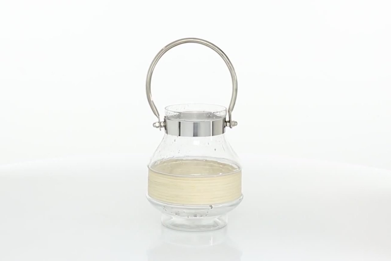 thumbnail video image 2 of DecMode Clear Glass Decorative Candle Lantern with Curved Handle, 2 of 11