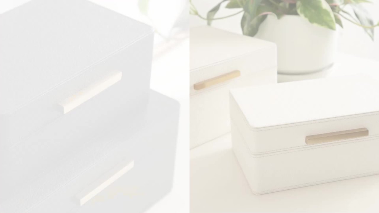 thumbnail video image 2 of Kate and Laurel Namina Decorative Vegan Leather Storage Box Set of 2, 8 x 5 and 10 x 7, Ivory and Brass, Modern Glam Two-Piece Box Set with Handles for Use as Jewelry Boxes or Perfume Organizers, 2 of 10