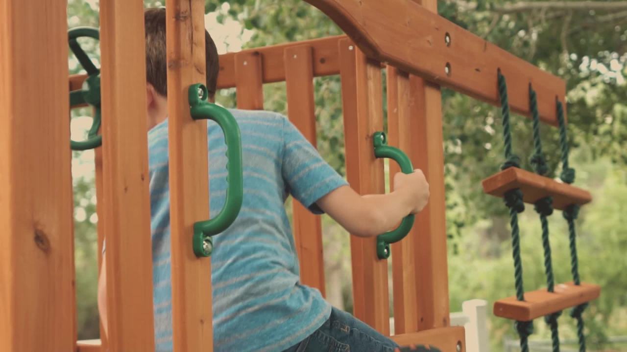 thumbnail video image 6 of Gorilla Playsets Great Skye II Treehouse Wooden Swing Set with 2 Swing Belts, 3 Slides, and Rope Ladder, 6 of 6