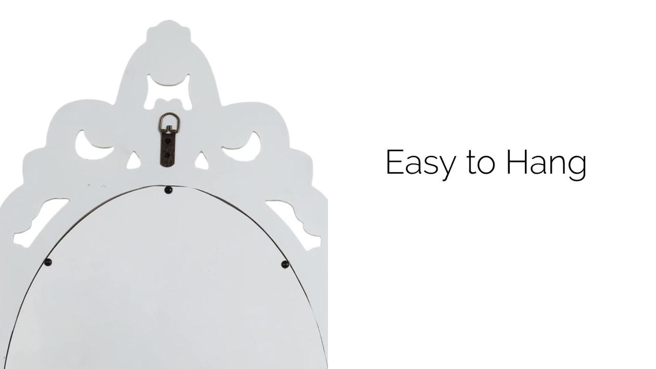 thumbnail video image 2 of Kate and Laurel Pietra Traditional Decorative Oval Wall Mirror, 20 x 32, White, Soft Vintage Mirror with Ornate Carved Detailing for Small Powder Room Vanity, 2 of 8