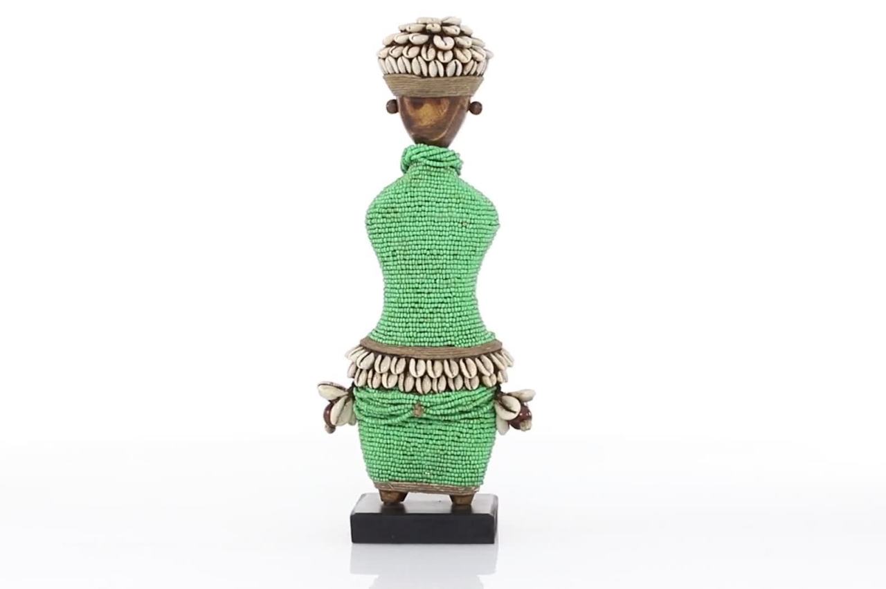 thumbnail video image 2 of DecMode Small Hand-Crafted Pine Wood, Cowrie Shells, Orange Beads & Kente Cloth African Woman Namji Doll, Green, 2 of 10