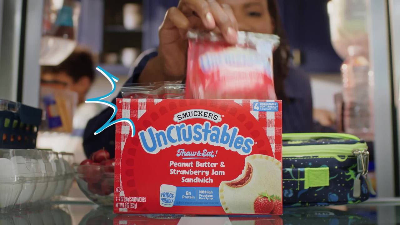 thumbnail video image 2 of Smucker’s Uncrustables Peanut Butter & Strawberry Jam Sandwiches, 4 Count, 2 oz Each, Frozen, 2 of 14