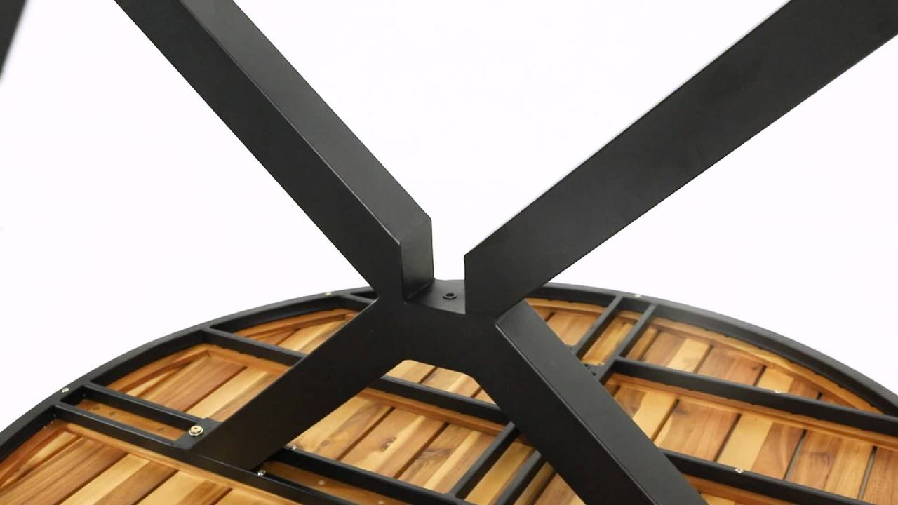 thumbnail video image 2 of Mellie Outdoor Acacia Wood Circular Dining Table, Teak and Black, 2 of 10