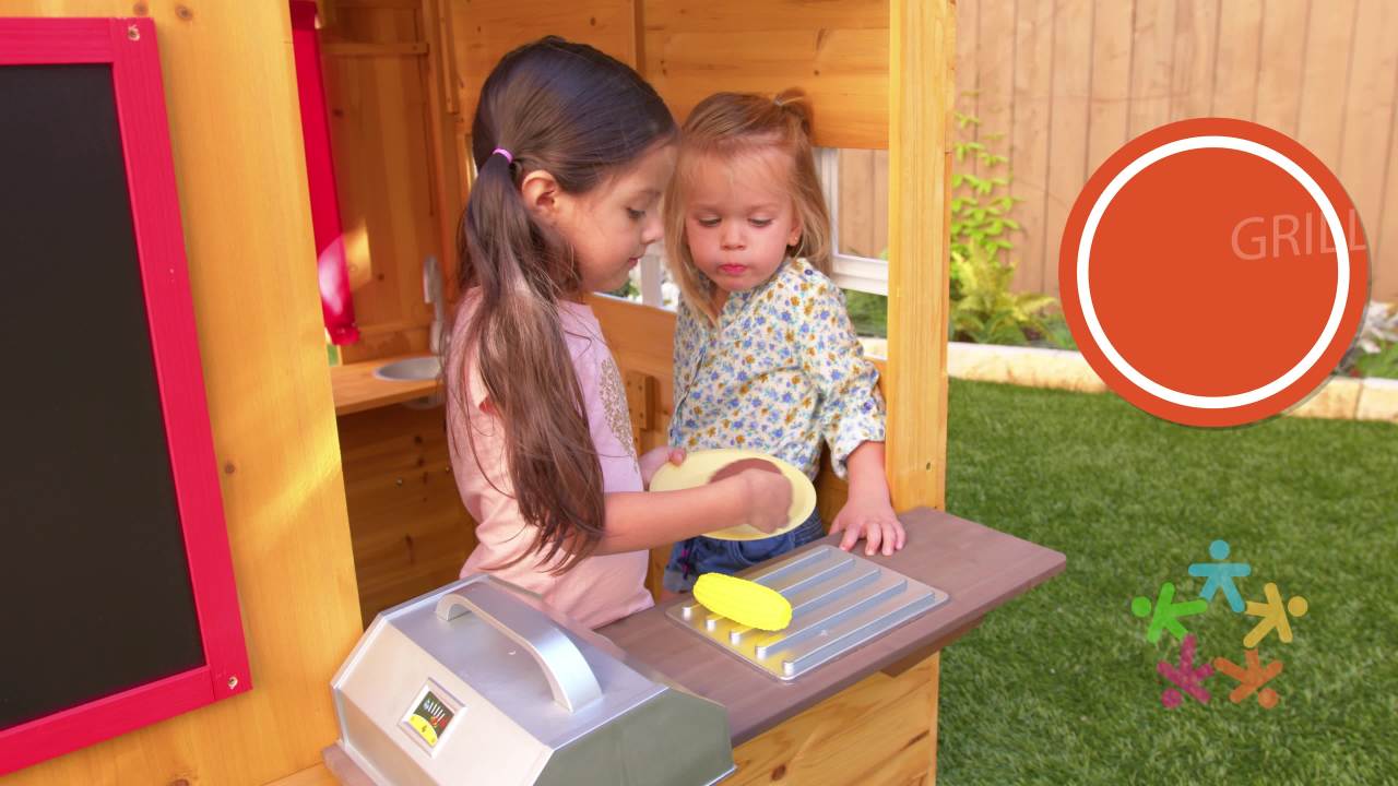thumbnail video image 2 of KidKraft Modern Outdoor Wooden Playhouse with Picnic Table, 2 of 11