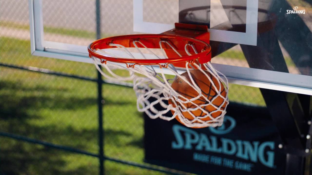 thumbnail video image 2 of Spalding Street Outdoor Basketball - 27.5" - Orange, 2 of 7