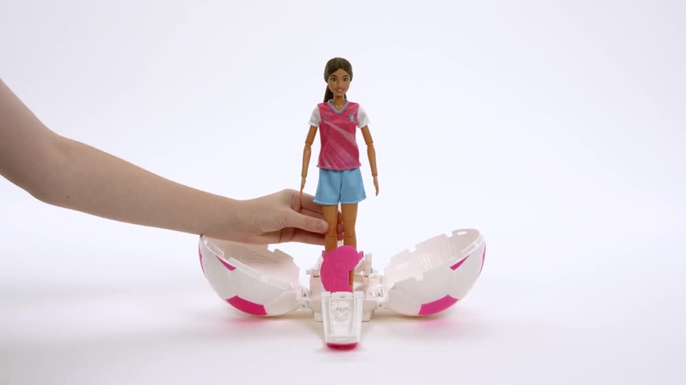 thumbnail video image 2 of Barbie Team Barbie Roll and Reveal Soccer Player Doll and Accessories with Brunette Fashion Doll, 8 Surprises & Soccer Ball Encasement, 2 of 7