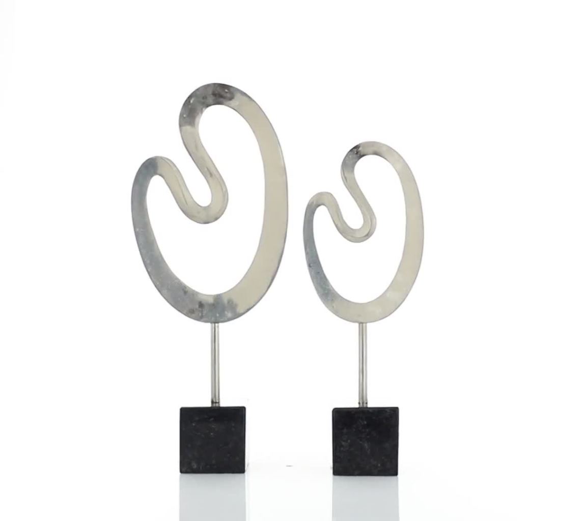 thumbnail video image 2 of 24", 21"H Silver Marble Abstract Sculpture with Black Base, by CosmoLiving by Cosmopolitan (2 Count), 2 of 9