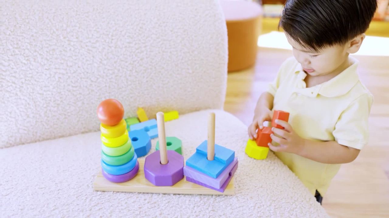 thumbnail video image 2 of Melissa & Doug Geometric Stacker - Wooden Educational Toy, 2 of 10