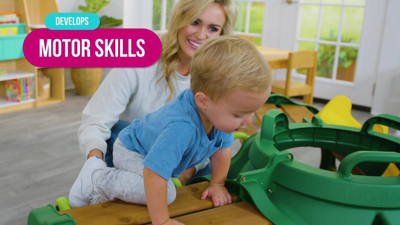 thumbnail video image 2 of KidKraft Hideout Hollow Toddler Climber with Slide and Peek-a-Book Flap, 2 of 7
