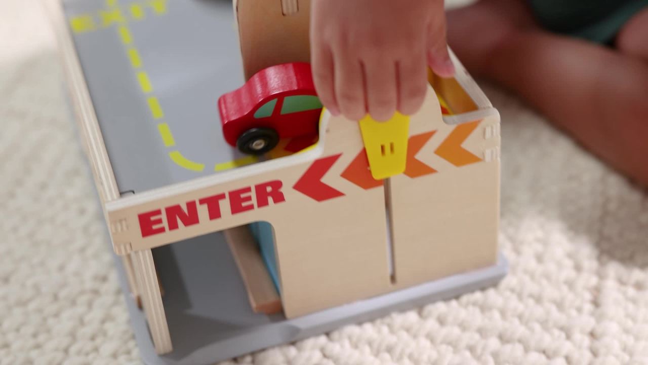 thumbnail video image 2 of Melissa & Doug Service Station Parking Garage With 2 Wooden Cars and Drive-Thru Car Wash, 2 of 10