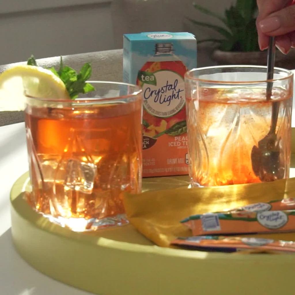 thumbnail video image 2 of Crystal Light Drink Mix, 16 Pitcher Packets, for Flavorful Hydration and Shareable Refreshment, Artificially Flavored Peach Iced Tea, Made with Black Tea, 4.55 oz, 2 of 16