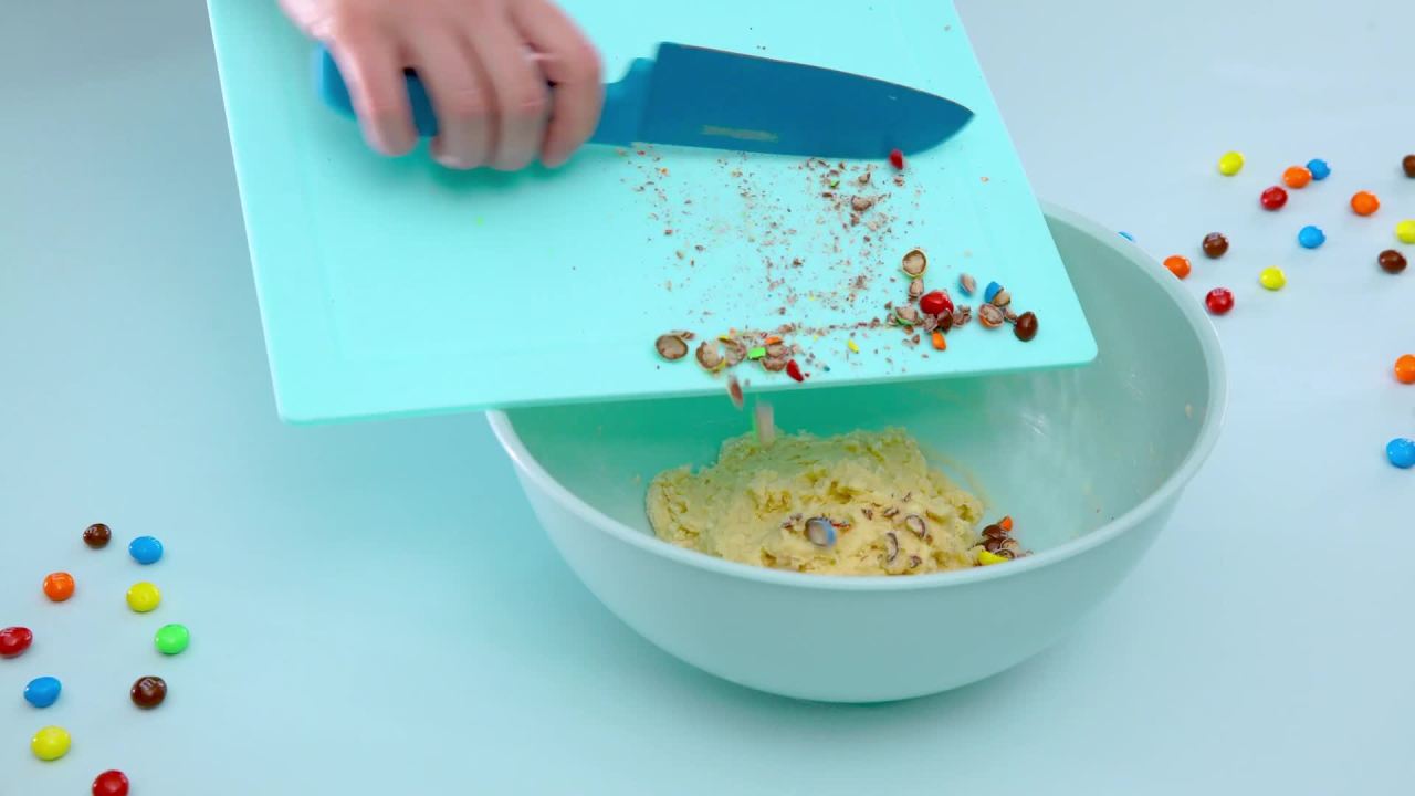 thumbnail video image 2 of M&M's Crunchy Cookie Milk Chocolate Candy, Share Size - 2.83 oz Bag, 2 of 12