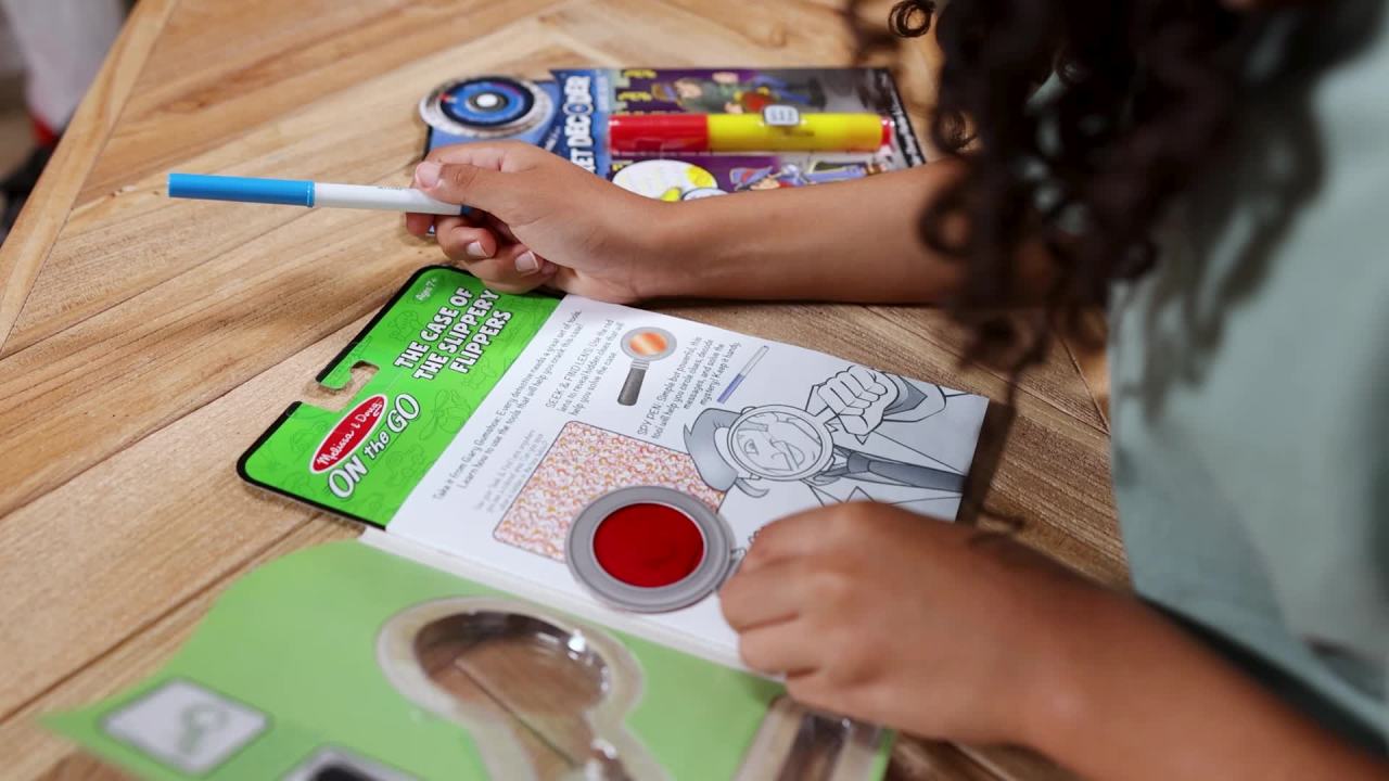 thumbnail video image 2 of Melissa & Doug On the Go Secret Decoder Activity Books 3-Pack (54 Games), 2 of 10