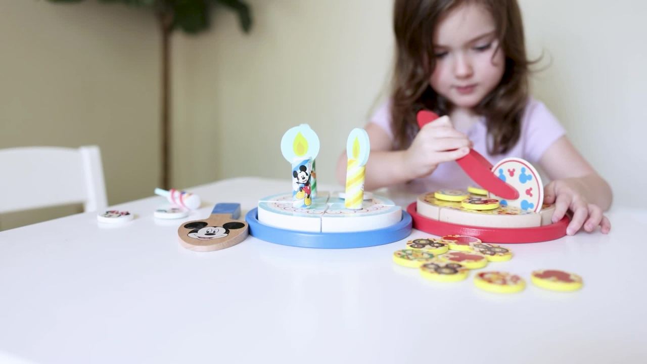 thumbnail video image 2 of Melissa & Doug Disney Mickey Mouse Wooden Pizza and Birthday Cake Set (32 Pieces, Play Food, Great Gift for Girls and Boys - Best for 3, 4, 5 Year Olds and Up), 2 of 6