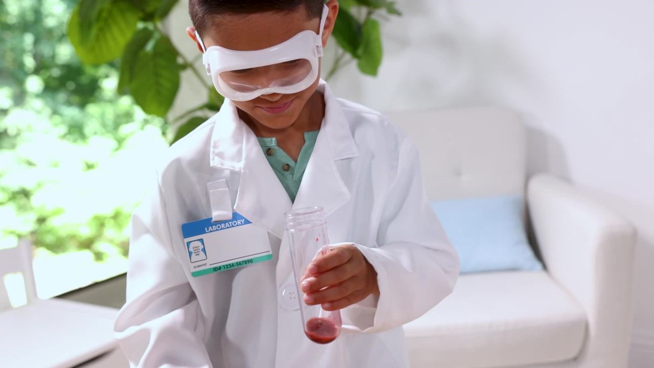 thumbnail video image 2 of Melissa & Doug Scientist Role Play Costume Set (X pcs) - Lab Coat, Goggles, 6 Experiments, 2 of 10